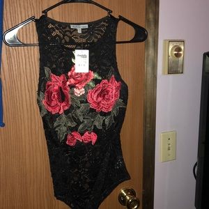 Brand new see through bodysuit